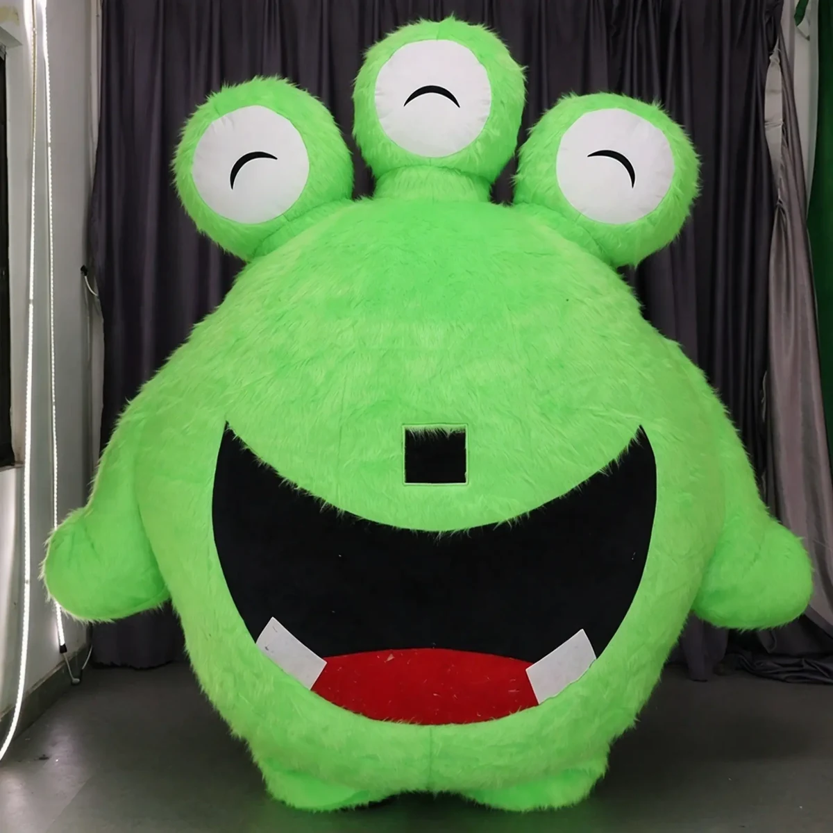 Green Three-Eye Monster Mascot — inflatable mascot costume, factory photo
